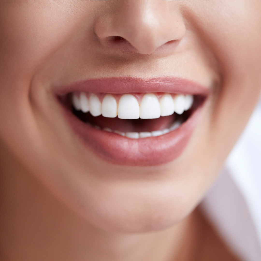 What are the disadvantages of dental implants vs. real teeth